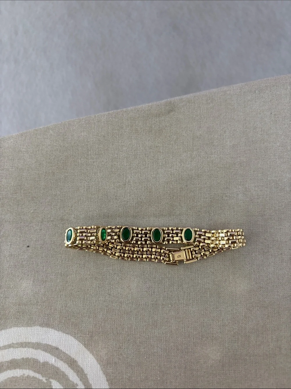 Gold Tone Bracelet with Green Oval Stones